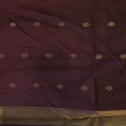 Dark brown semi tussar saree, with rich traditional zari weaving all over (thin, Textured) rich pallu, running blouse with zari woven buttas and borders. NS315