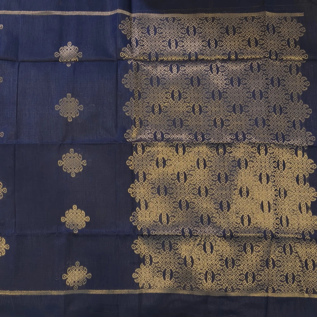Dark blue semi tussar saree, with rich traditional zari weaving all over (thin, Textured) rich pallu, running blouse with zari woven buttas and borders. NS312