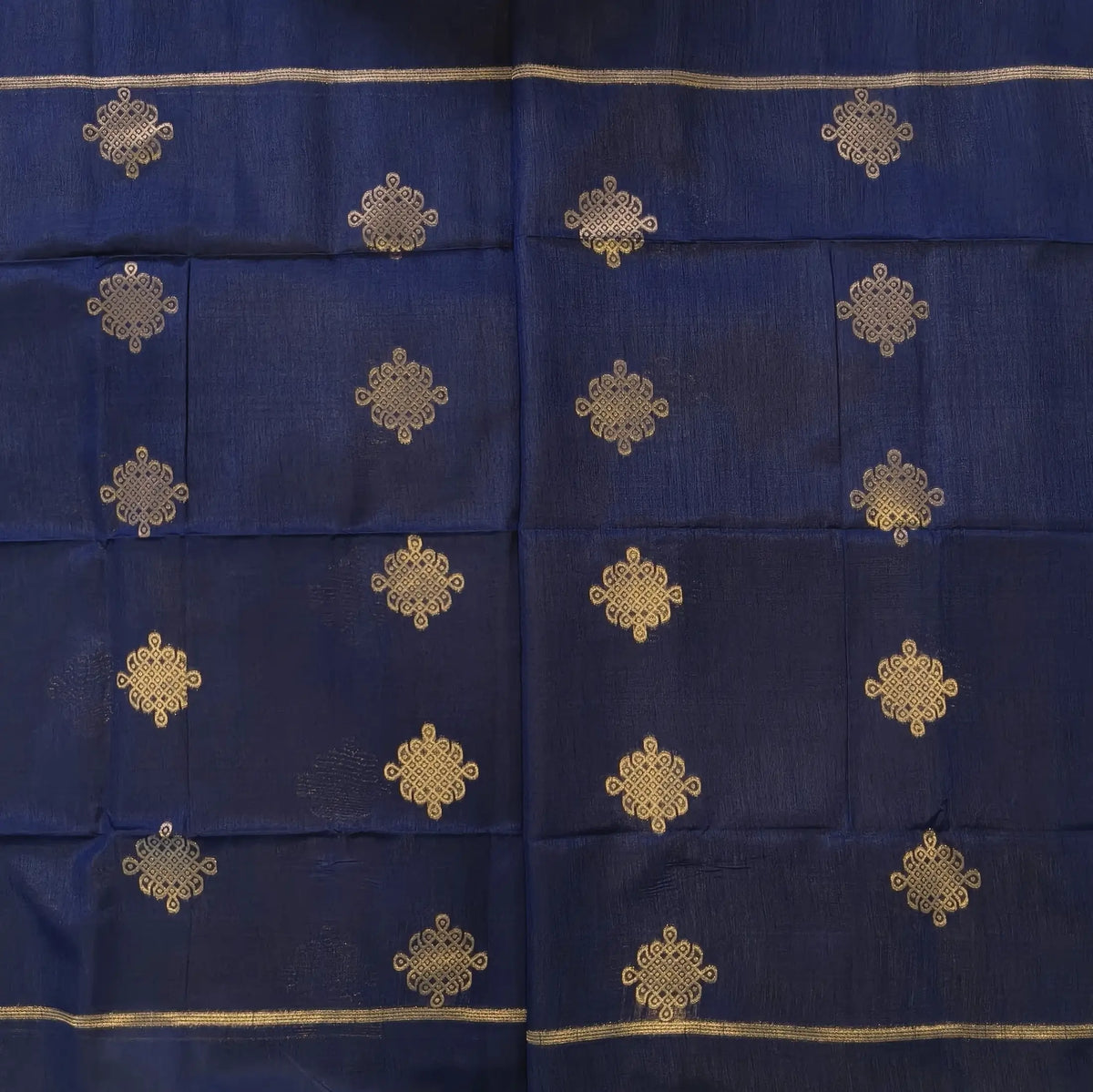 Dark blue semi tussar saree, with rich traditional zari weaving all over (thin, Textured) rich pallu, running blouse with zari woven buttas and borders. NS312