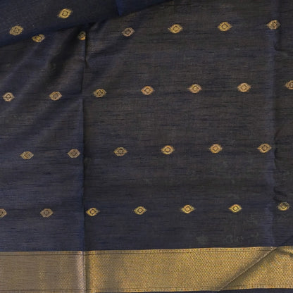 Dark blue semi tussar saree, with rich traditional zari weaving all over (thin, Textured) rich pallu, running blouse with zari woven buttas and borders. NS312