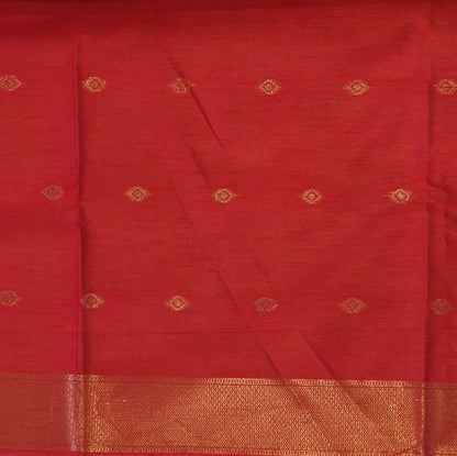 Red semi tussar saree, with rich traditional zari weaving all over (thin, Textured) rich pallu, running blouse with zari woven buttas and borders. NS311