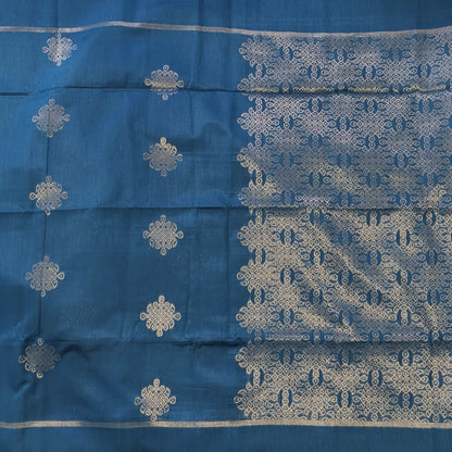 Dark turquoise blue semi tussar saree, with rich traditional zari weaving all over (thin, Textured) rich pallu, running blouse with zari woven buttas and borders. NS318