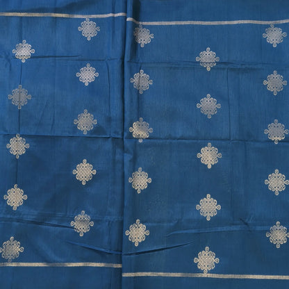 Dark turquoise blue semi tussar saree, with rich traditional zari weaving all over (thin, Textured) rich pallu, running blouse with zari woven buttas and borders. NS318