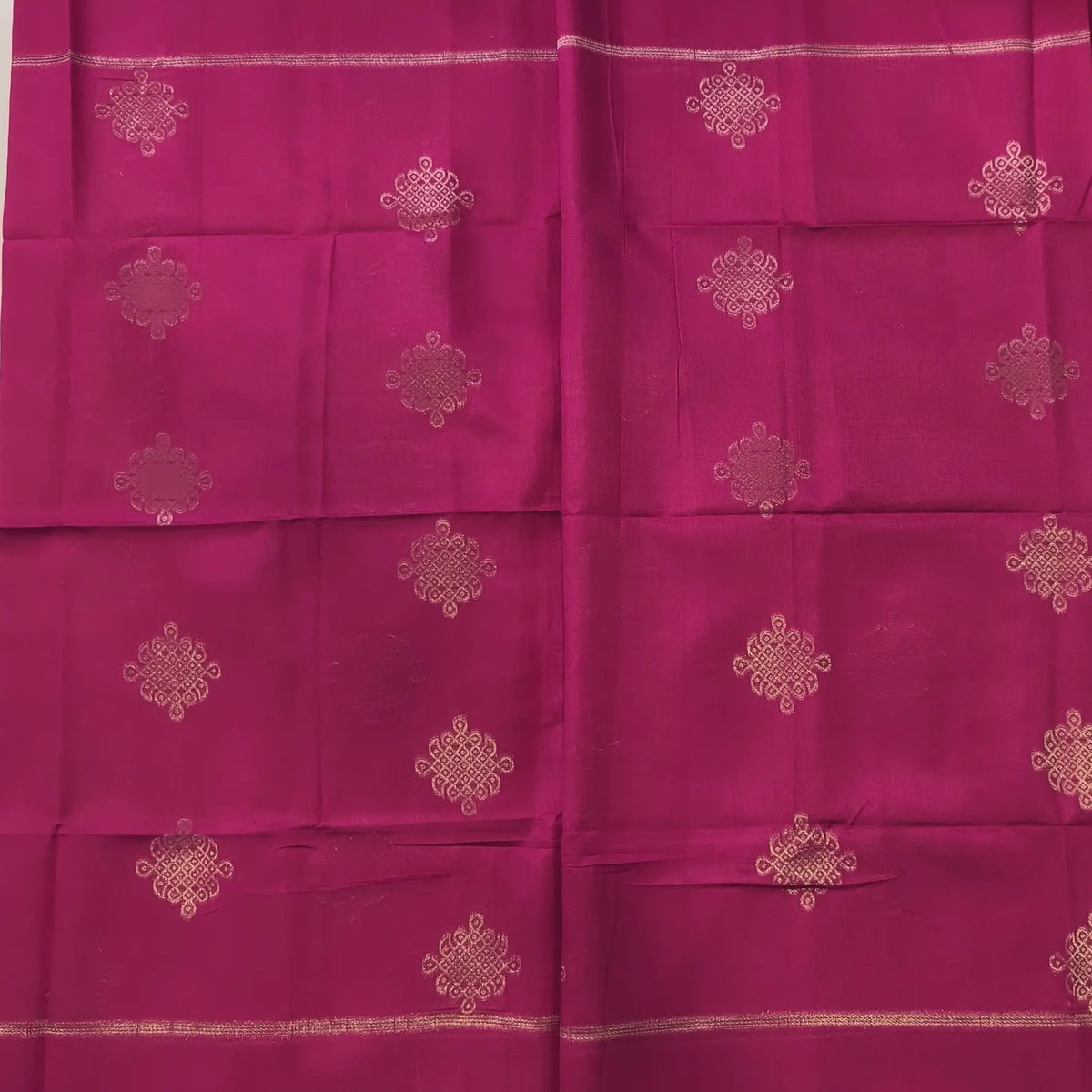 Bright pink semi tussar saree, with rich traditional zari weaving all over (thin, Textured) rich pallu, running blouse with zari woven buttas and borders. NS313
