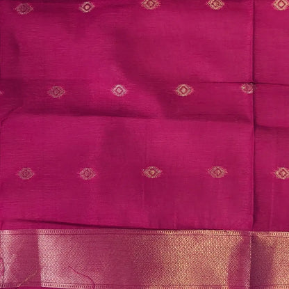 Bright pink semi tussar saree, with rich traditional zari weaving all over (thin, Textured) rich pallu, running blouse with zari woven buttas and borders. NS313