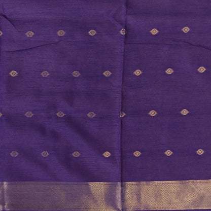 Purple semi tussar saree, with rich traditional zari weaving all over (thin, Textured) rich pallu, running blouse with zari woven buttas and borders. NS317