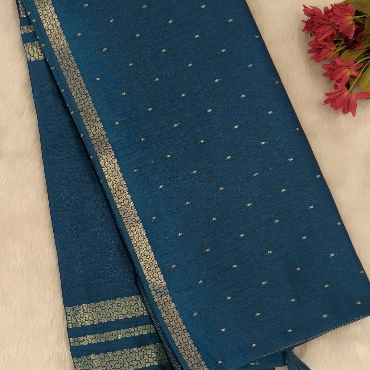 Dark teal blue viscous silk saree with zari buttas all over, thin double side zari borders (Thin, Soft) Striped pallu, zari and tissue striped running blouse. NS322