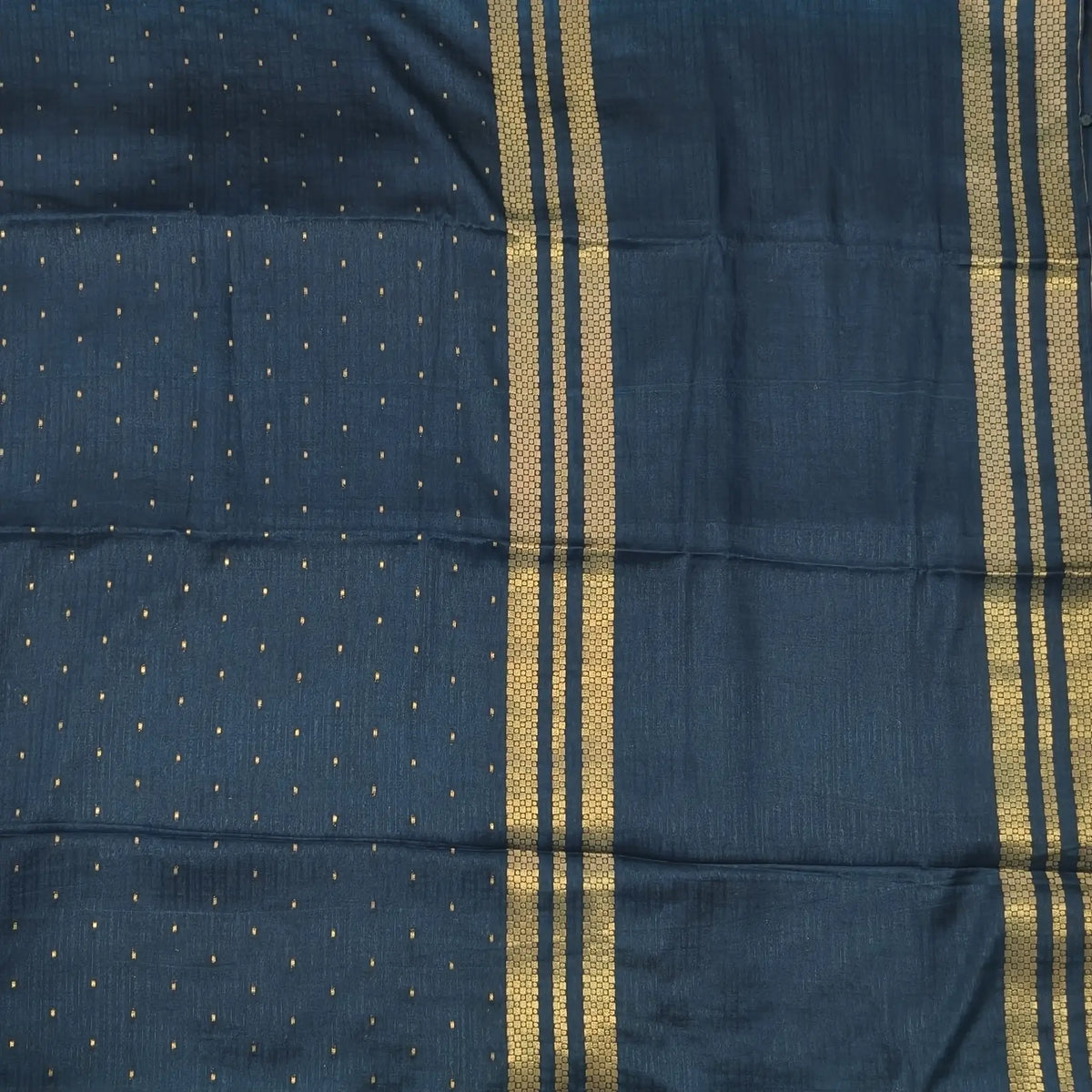 Dark teal blue viscous silk saree with zari buttas all over, thin double side zari borders (Thin, Soft) Striped pallu, zari and tissue striped running blouse. NS322