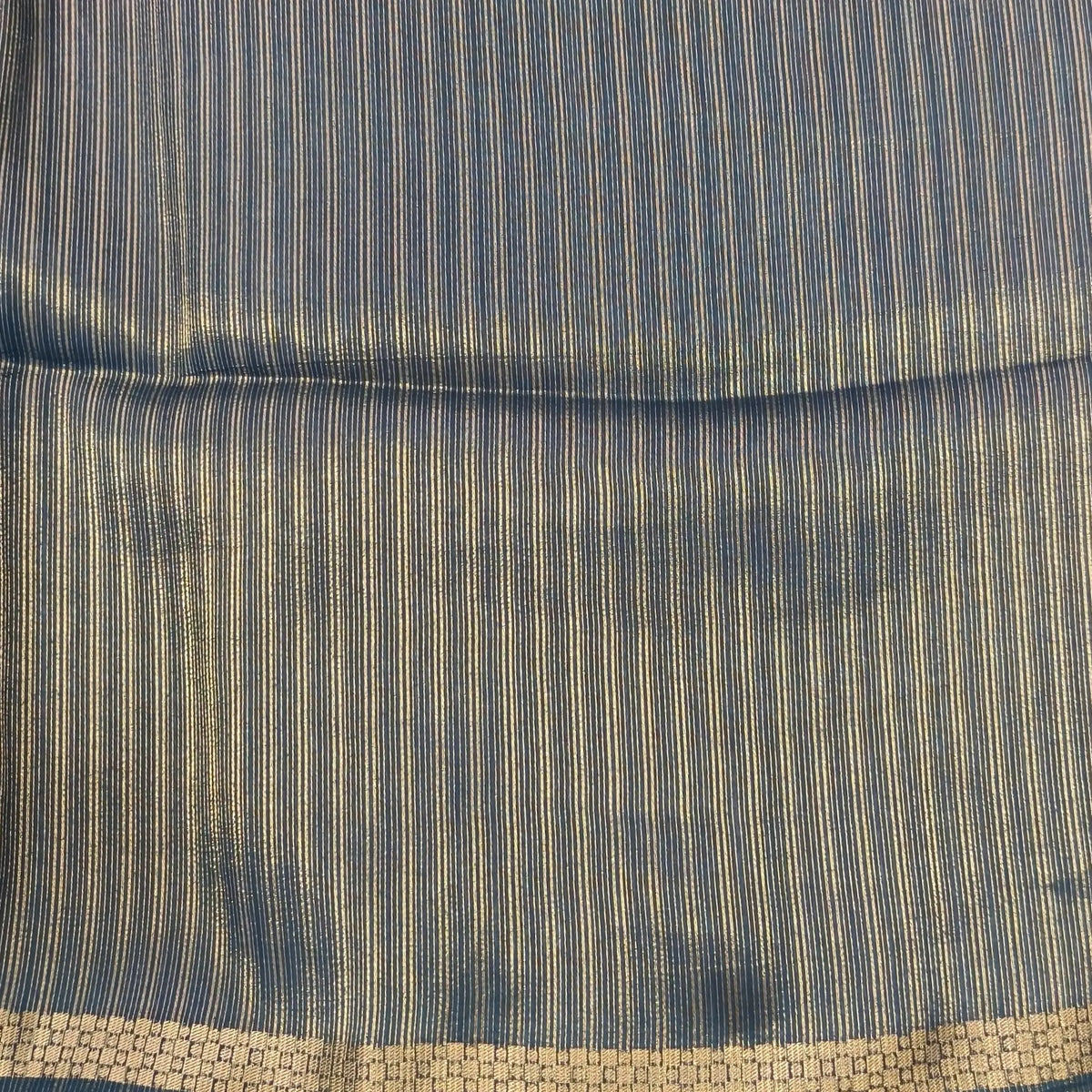 Dark teal blue viscous silk saree with zari buttas all over, thin double side zari borders (Thin, Soft) Striped pallu, zari and tissue striped running blouse. NS322