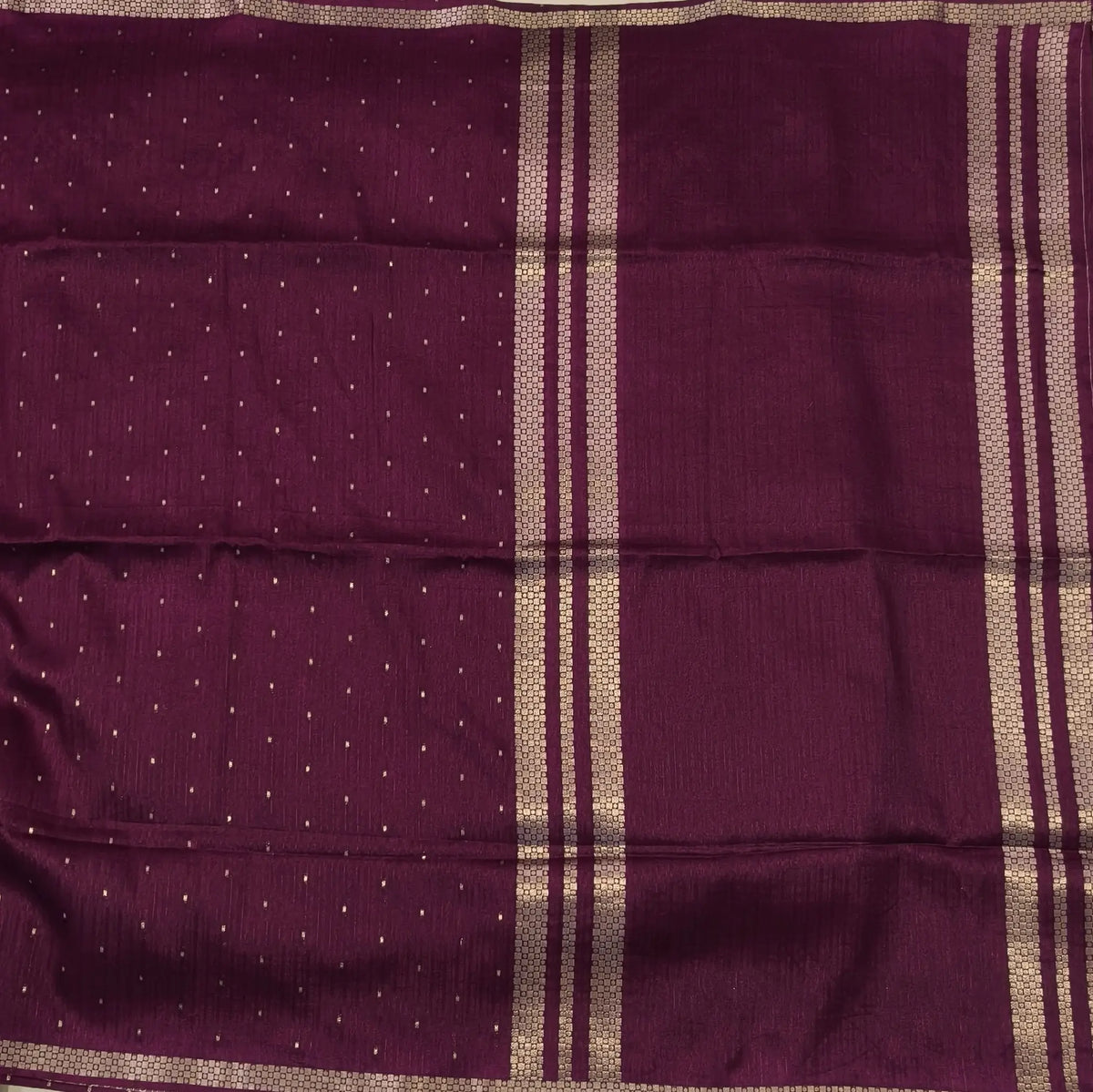 Dark beetroot purple viscous silk saree with zari buttas all over, thin double side zari borders (Thin, Soft) Striped pallu, zari and tissue striped running blouse. NS320