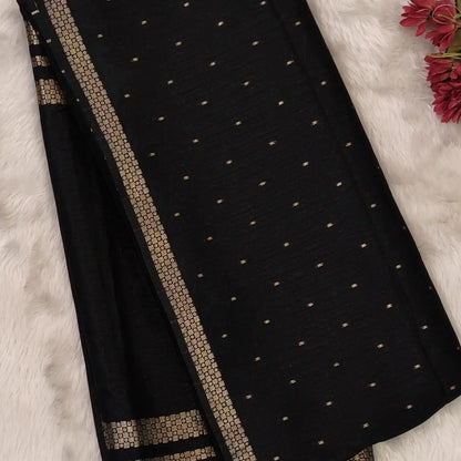 Black viscous silk saree with zari buttas all over, thin double side zari borders (Thin, Soft) Striped pallu, zari and tissue striped running blouse. NS319