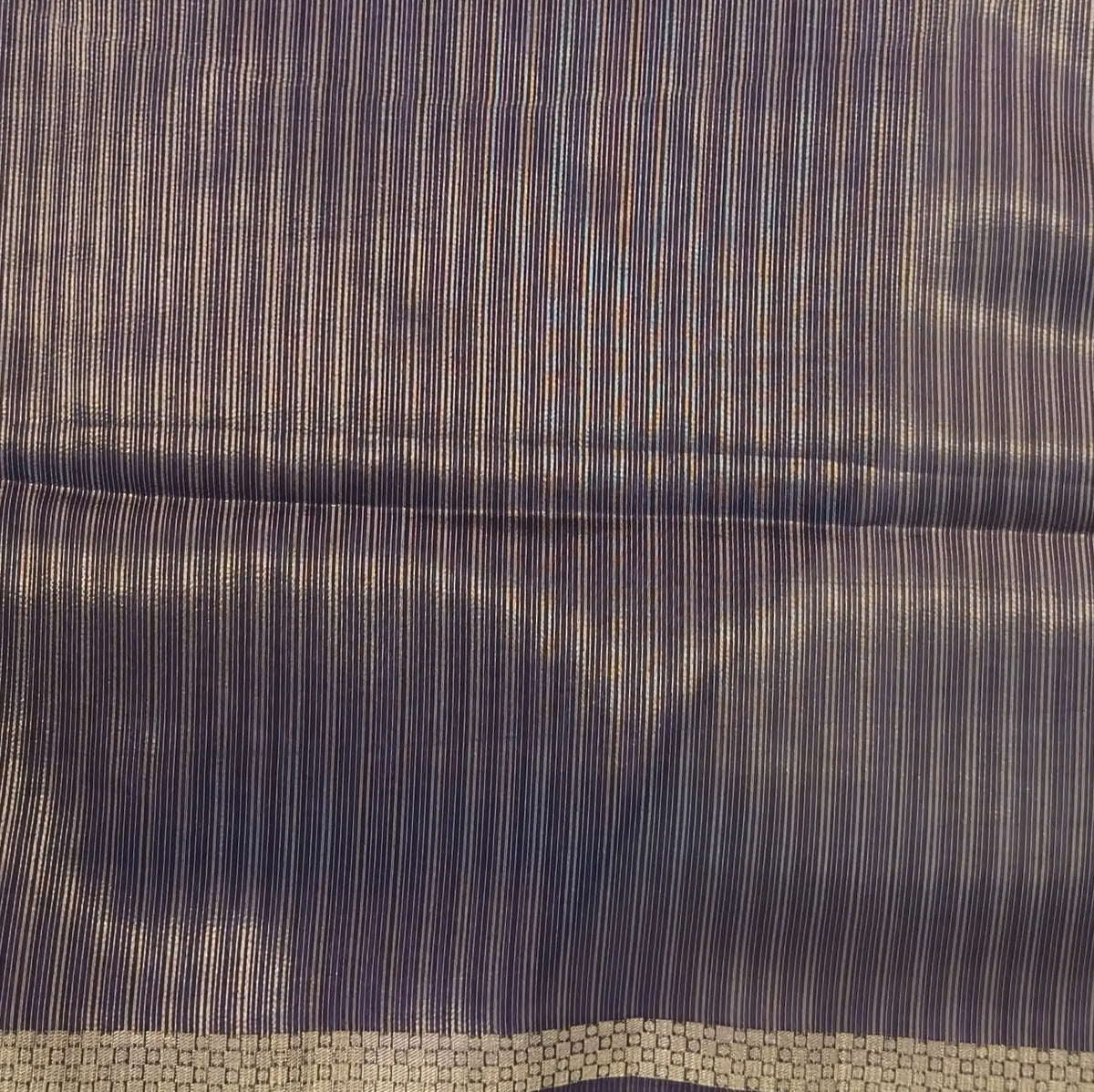 Dark purple viscous silk saree with zari buttas all over, thin double side zari borders (Thin, Soft) Striped pallu, zari and tissue striped running blouse. NS323