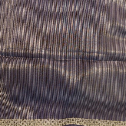 Dark purple viscous silk saree with zari buttas all over, thin double side zari borders (Thin, Soft) Striped pallu, zari and tissue striped running blouse. NS323