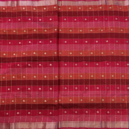 Multicoloured (Pink & red)soft silk cotton saree with zari woven checks & buttas all over, zari woven double side borders, tissue pallu,multicoloured running blouse with borders & buttas. NS26