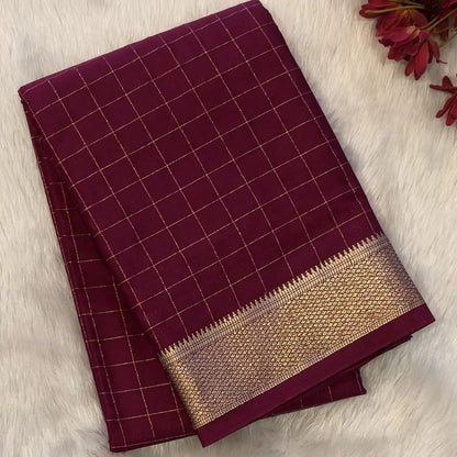 Dark beetroot purple soft fancy crepe silk saree,zari checks all over,(soft,thin)striped tissue pallu,double side zari woven borders,running blouse with zari checks and borders. NS344
