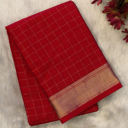 Bright red soft fancy crepe silk saree,zari checks all over,(soft,thin)striped tissue pallu,double side zari woven borders,running blouse with zari checks and borders. NS243