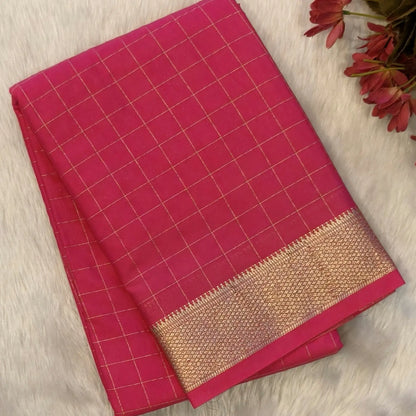 Peachish pink soft fancy crepe silk saree,zari checks all over,(soft,thin)striped tissue pallu,double side zari woven borders,running blouse with zari checks and borders. NS240