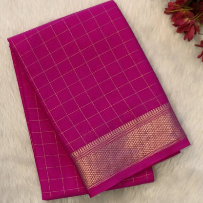 Bright pink soft fancy crepe silk saree,zari checks all over,(soft,thin)striped tissue pallu,double side zari woven borders,running blouse with zari checks and borders. NS238