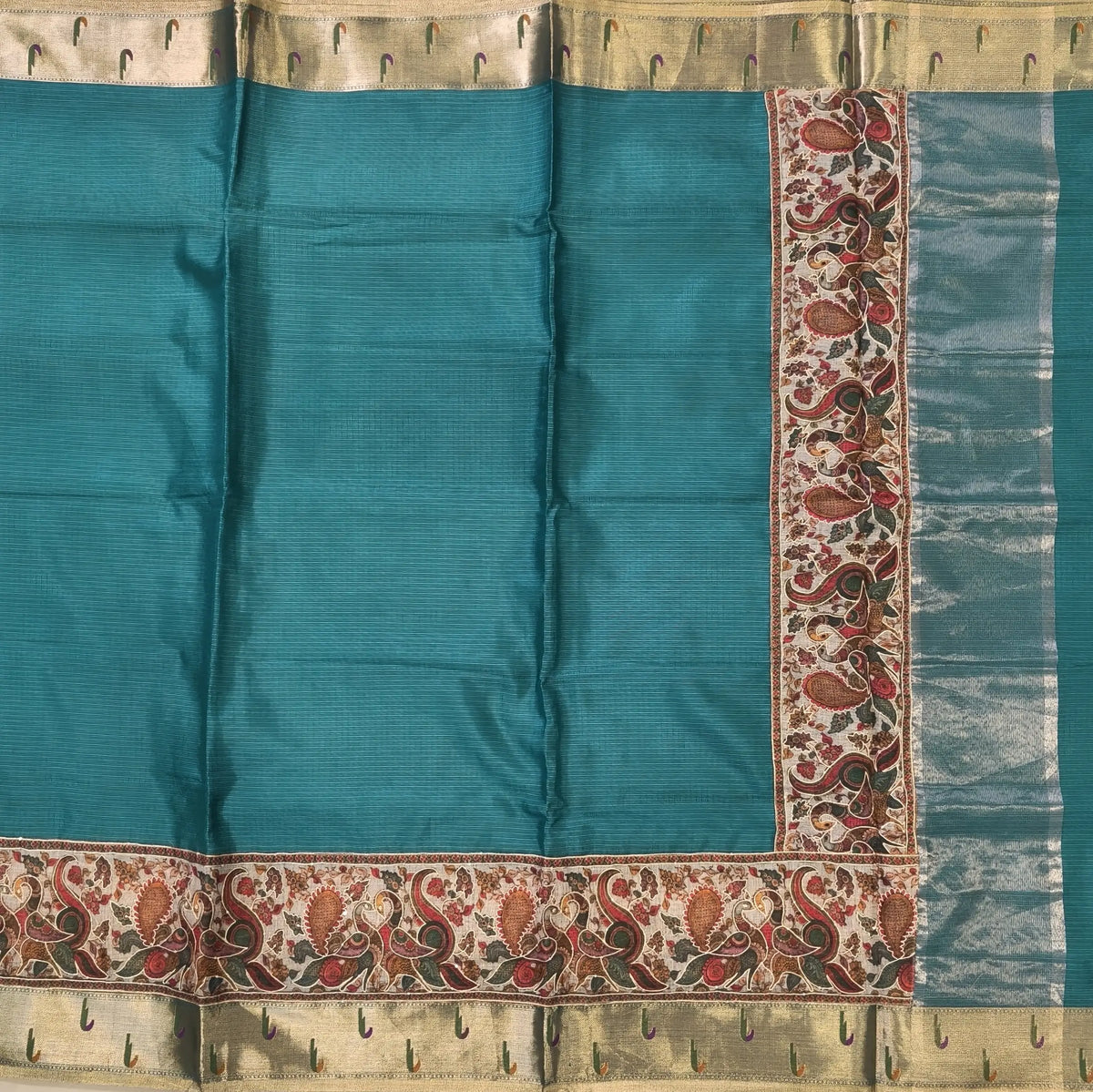 Turquoise blue premium kota silk saree with rich applique embroidered and paithani woven borders(soft, thin)applique and tissue striped pallu,plain kota silk running blouse with paithani borders. NS236