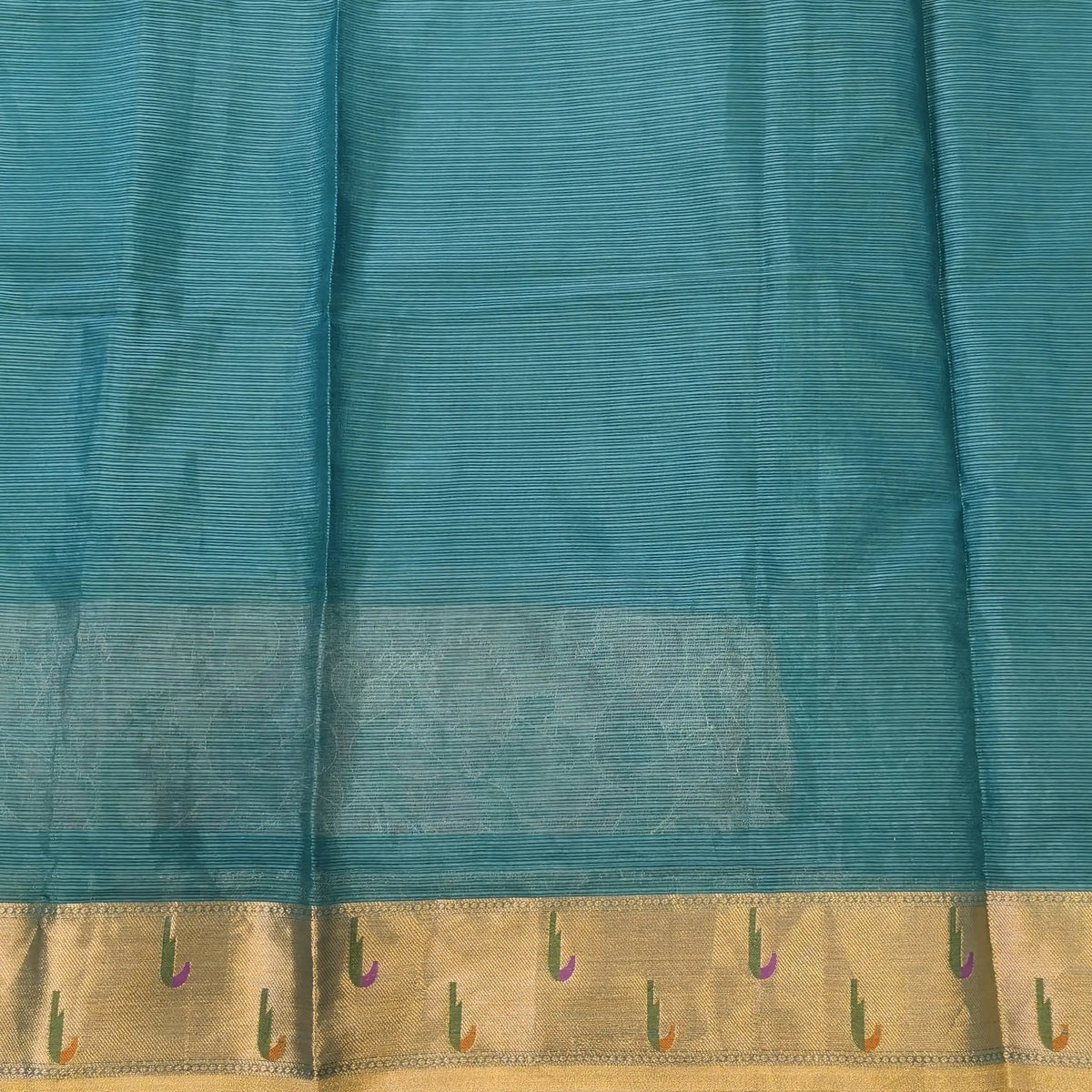 Turquoise blue premium kota silk saree with rich applique embroidered and paithani woven borders(soft, thin)applique and tissue striped pallu,plain kota silk running blouse with paithani borders. NS236