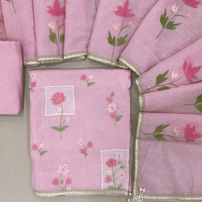 Designer pastel pink mul chanderi unstitched salwar material,rich floral thread embroidery work on front, ( soft,lining needed)santoon bottom, hand brush paint work on mul chanderi dupatta with lace tapping and beaded tassles. OC260902