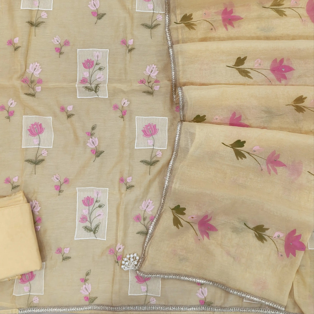Designer pastel yellow mul chanderi unstitched salwar material,rich floral thread embroidery work on front, ( soft,lining needed)santoon bottom, hand brush paint work on mul chanderi dupatta with lace tapping and beaded tassles. OC260903