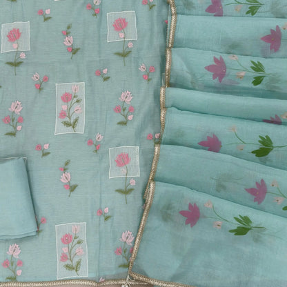 Designer sea green mul chanderi unstitched salwar material,rich floral thread embroidery work on front, ( soft,lining needed)santoon bottom, hand brush paint work on mul chanderi dupatta with lace tapping and beaded tassles. OC260901