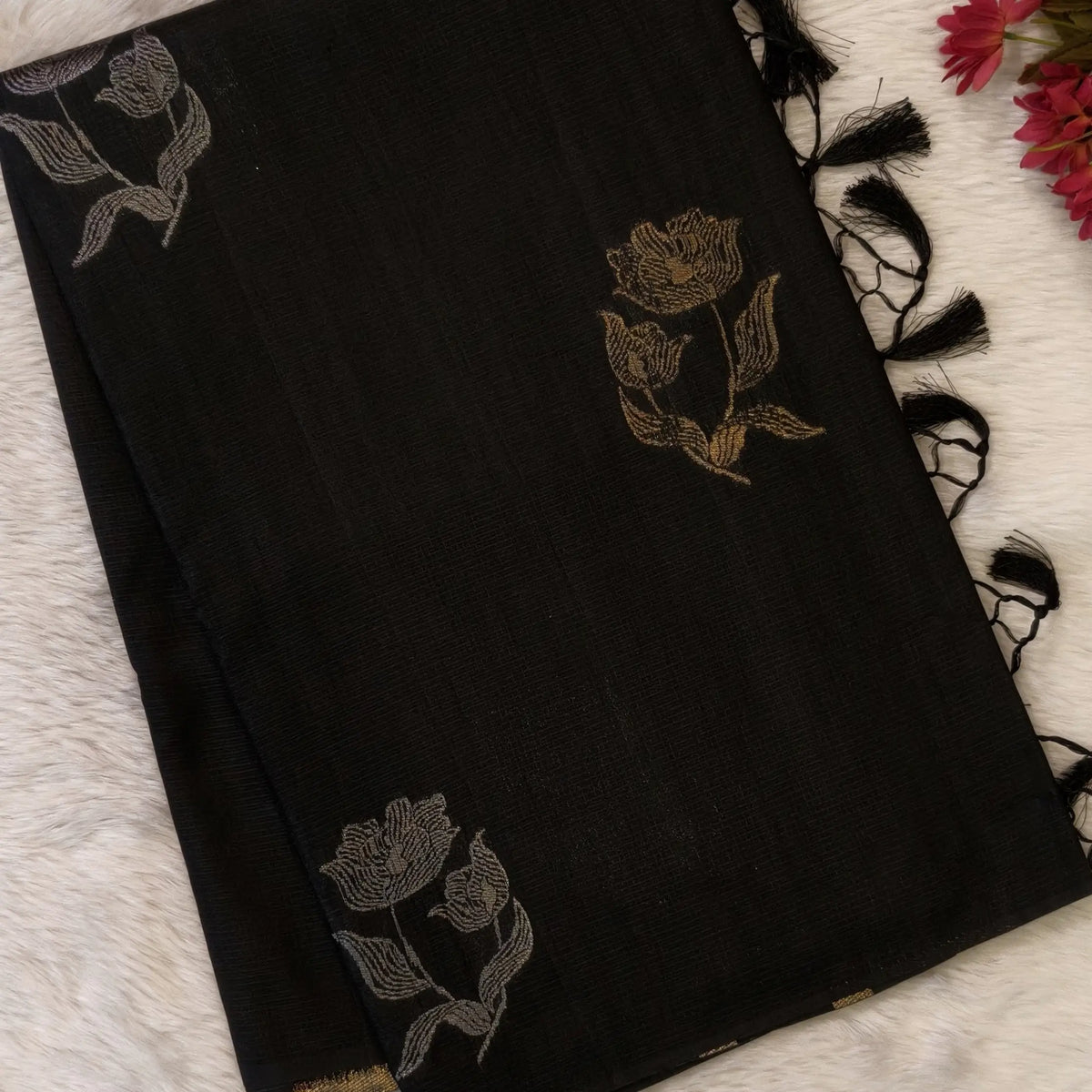 Black premium ribbed silk saree(textured,thin)with silver and antique gold zari,weaving all over,antique gold zari woven pallu,running blouse with zari woven buttas and borders. NS250