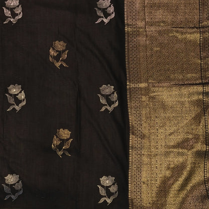 Black premium ribbed silk saree(textured,thin)with silver and antique gold zari,weaving all over,antique gold zari woven pallu,running blouse with zari woven buttas and borders. NS250