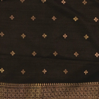 Black premium ribbed silk saree(textured,thin)with silver and antique gold zari,weaving all over,antique gold zari woven pallu,running blouse with zari woven buttas and borders. NS250