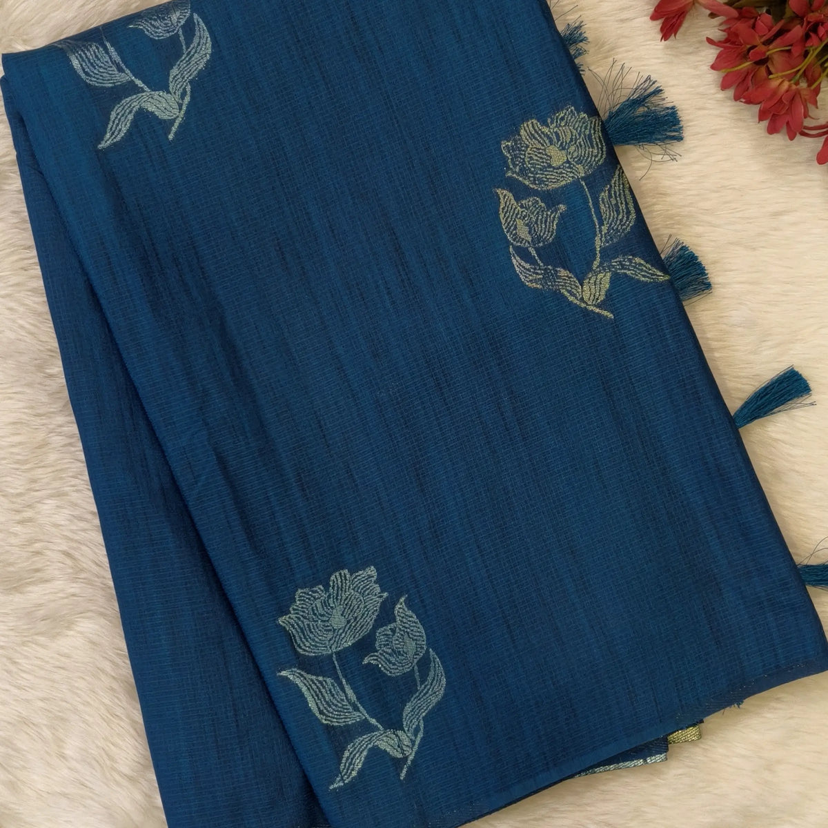 Dark turquoise blue premium ribbed silk saree(textured,thin)with silver and antique gold zari,weaving all over,antique gold zari woven pallu,running blouse with zari woven buttas and borders. NS348