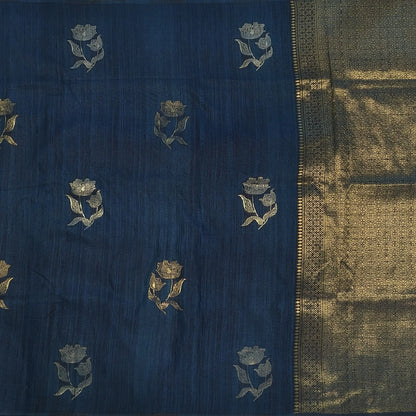 Dark turquoise blue premium ribbed silk saree(textured,thin)with silver and antique gold zari,weaving all over,antique gold zari woven pallu,running blouse with zari woven buttas and borders. NS348