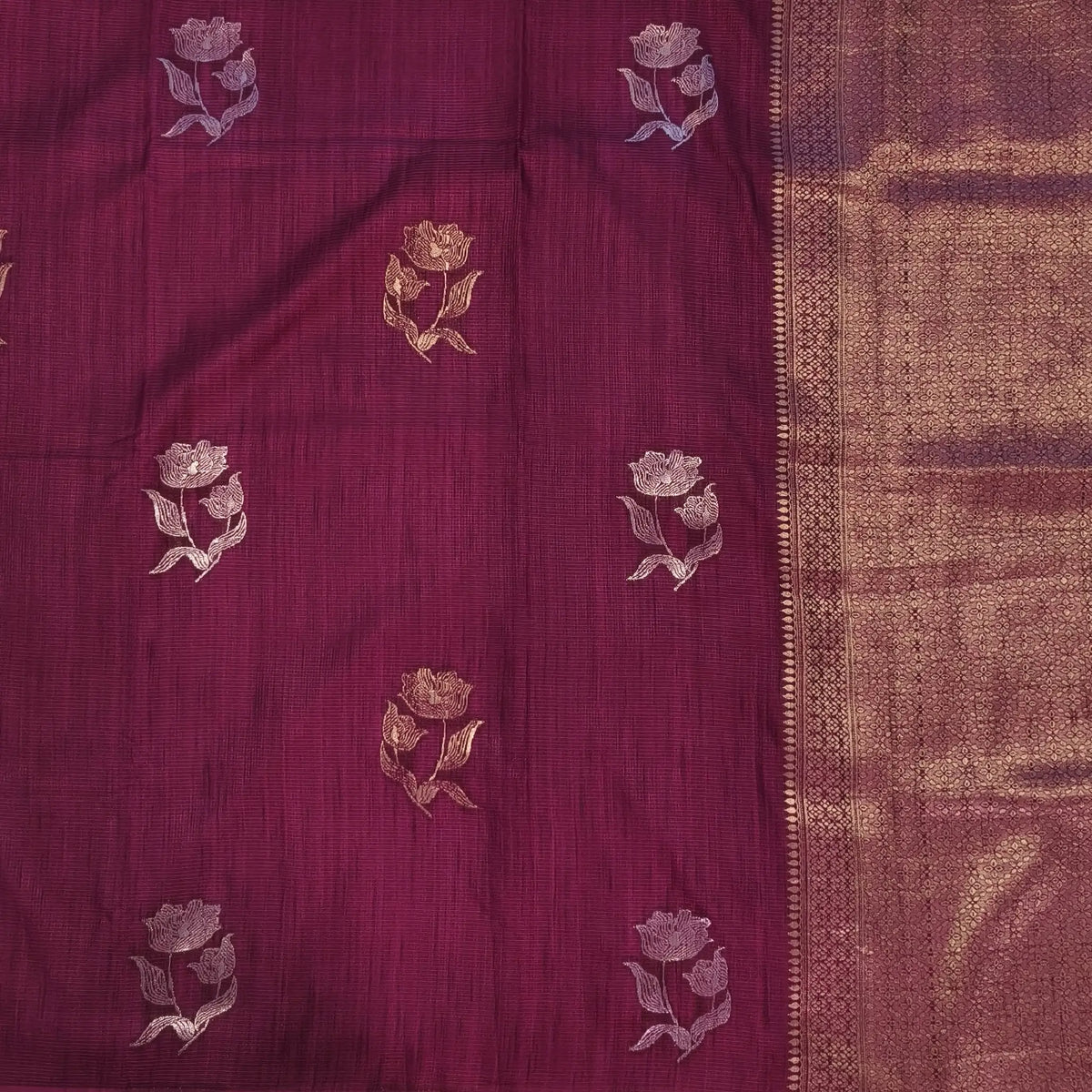 Dark beetroot purple premium ribbed silk saree(textured,thin)with silver and antique gold zari,weaving all over,antique gold zari woven pallu,running blouse with zari woven buttas and borders. NS249