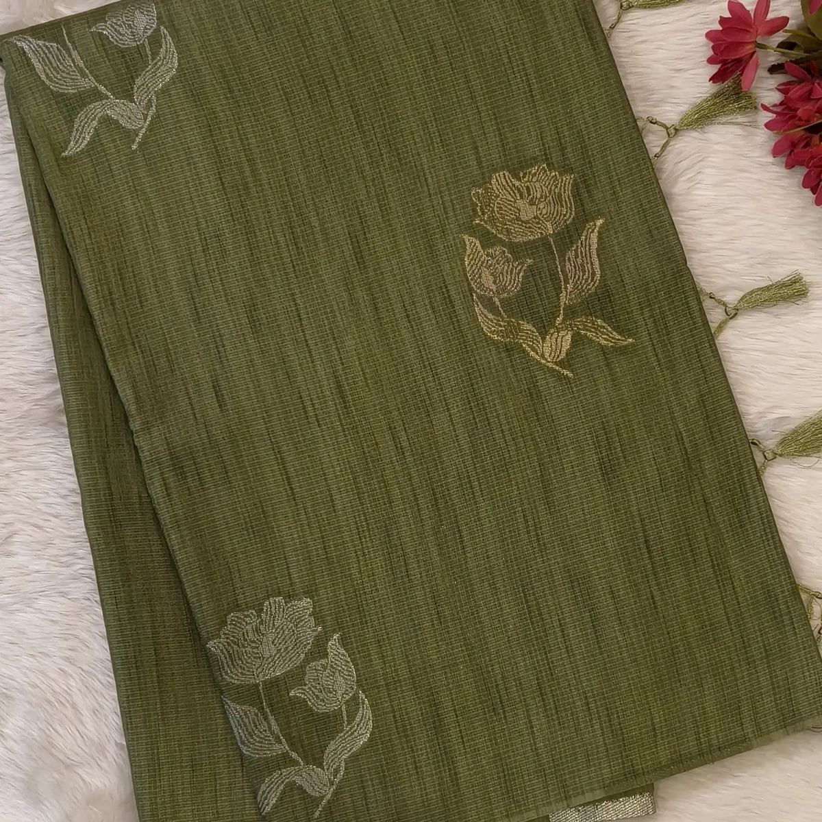 Sage green premium ribbed silk saree(textured,thin)with silver and antique gold zari,weaving all over,antique gold zari woven pallu,running blouse with zari woven buttas and borders. NS252