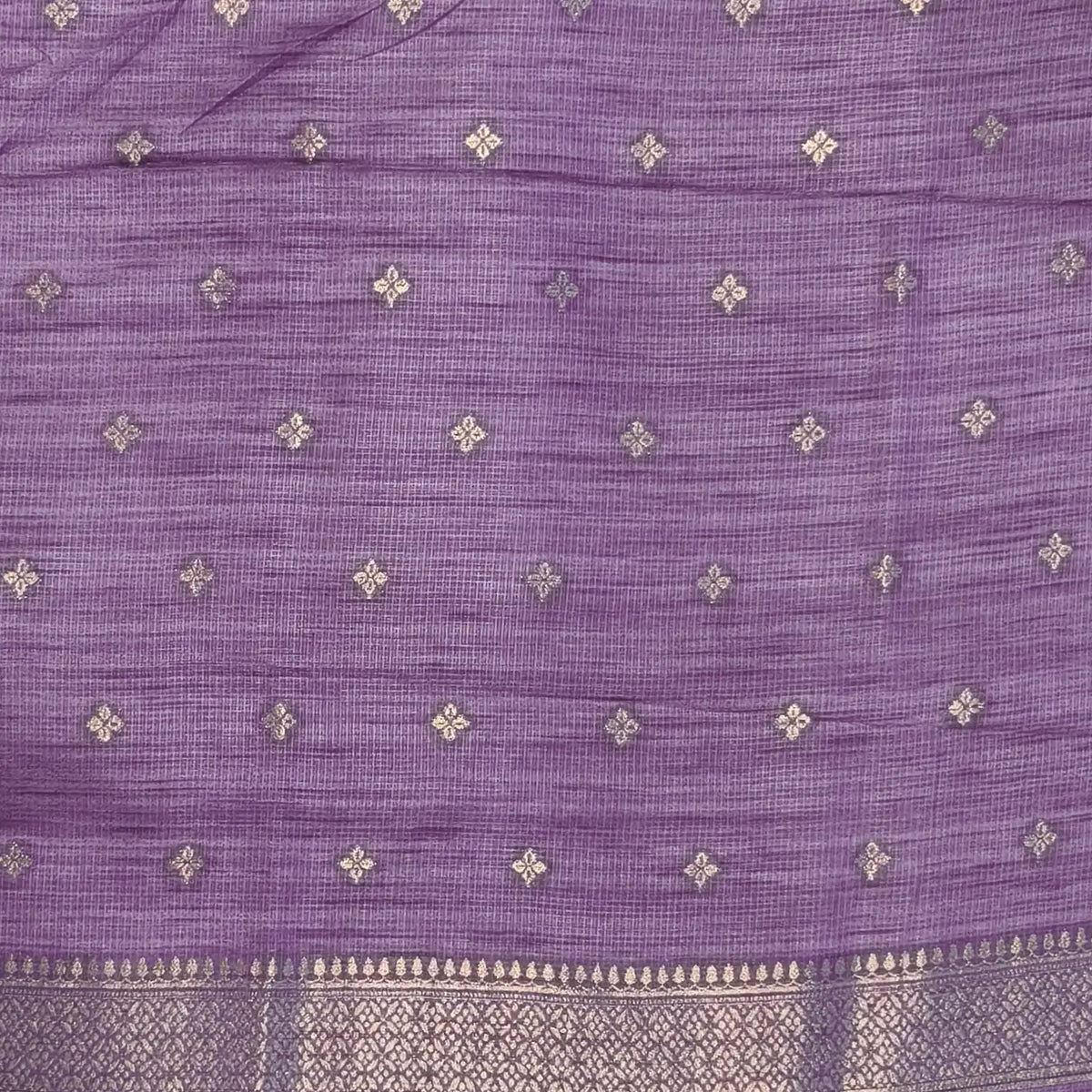 Lavender premium ribbed silk saree(textured,thin)with silver and antique gold zari,weaving all over,antique gold zari woven pallu,running blouse with zari woven buttas and borders. NS246
