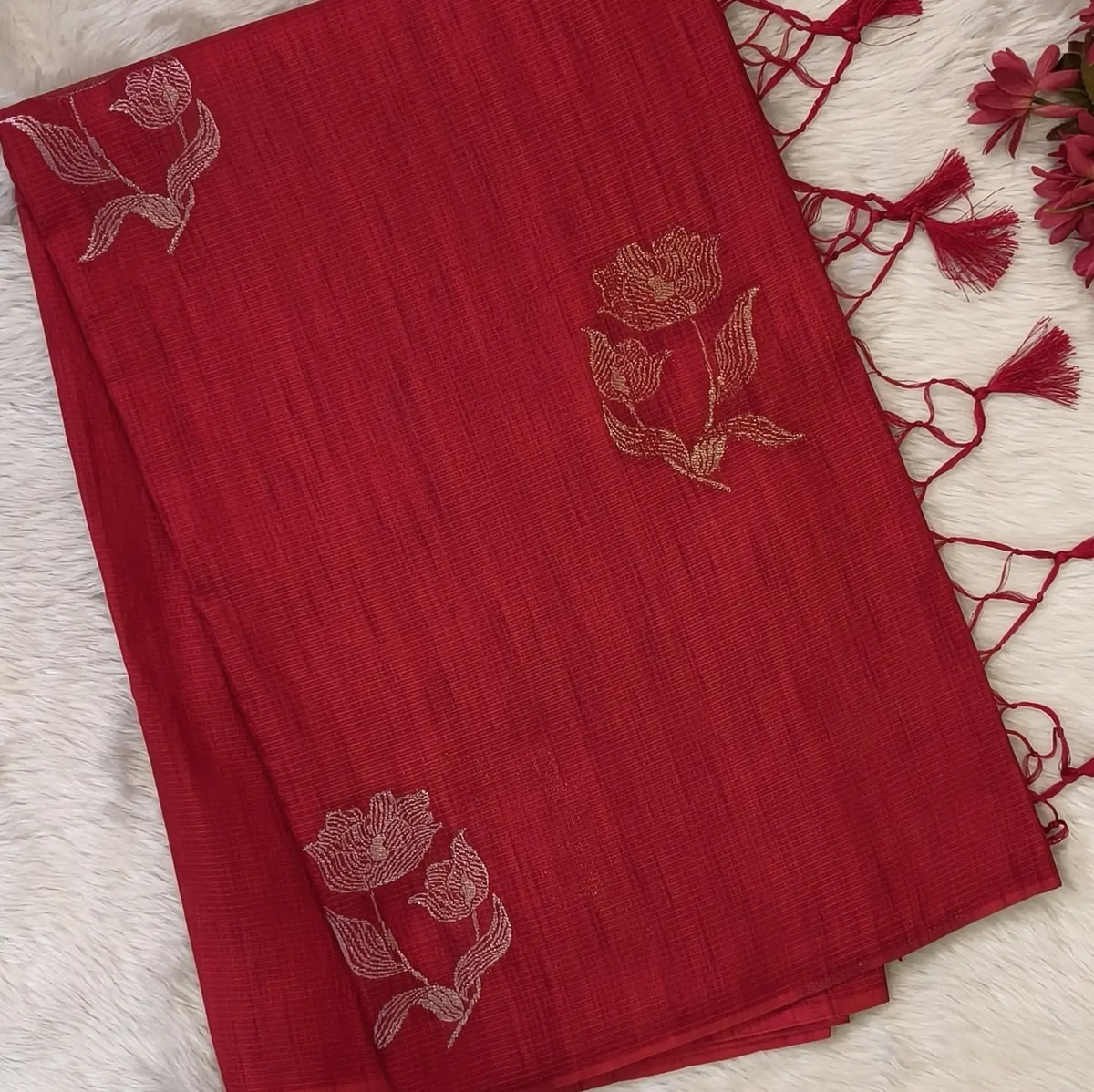 Red premium ribbed silk saree(textured,thin)with silver and antique gold zari,weaving all over,antique gold zari woven pallu,running blouse with zari woven buttas and borders. NS251