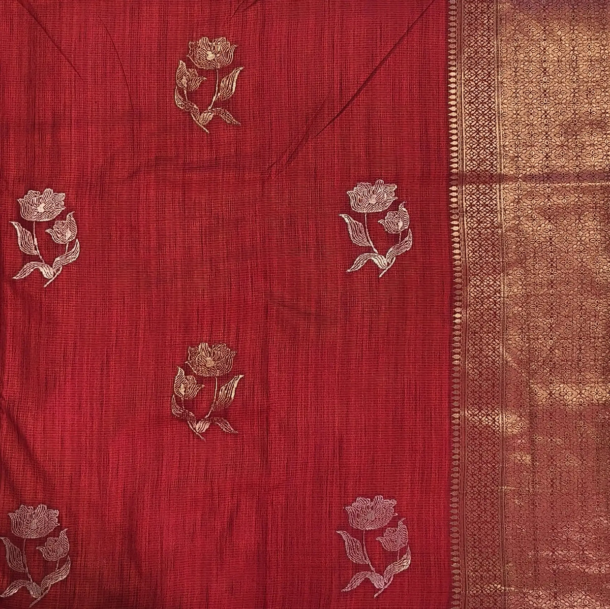 Red premium ribbed silk saree(textured,thin)with silver and antique gold zari,weaving all over,antique gold zari woven pallu,running blouse with zari woven buttas and borders. NS251