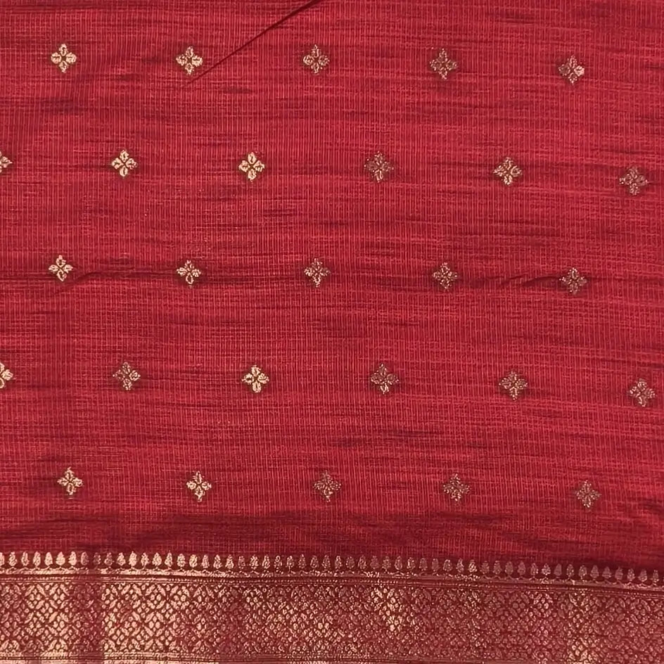 Red premium ribbed silk saree(textured,thin)with silver and antique gold zari,weaving all over,antique gold zari woven pallu,running blouse with zari woven buttas and borders. NS251