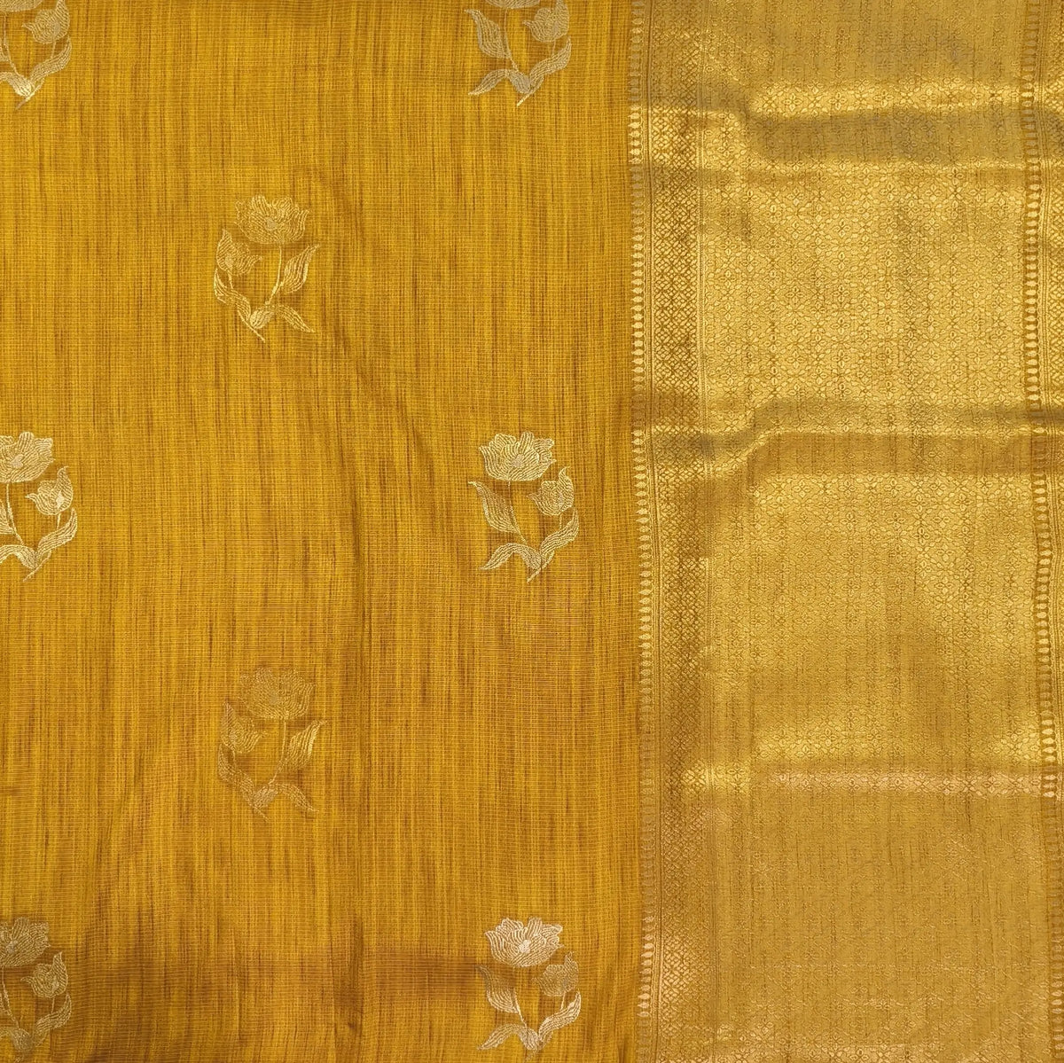 Fenugreek yellow premium ribbed silk saree(textured,thin)with silver and antique gold zari,weaving all over,antique gold zari woven pallu,running blouse with zari woven buttas and borders. NS253