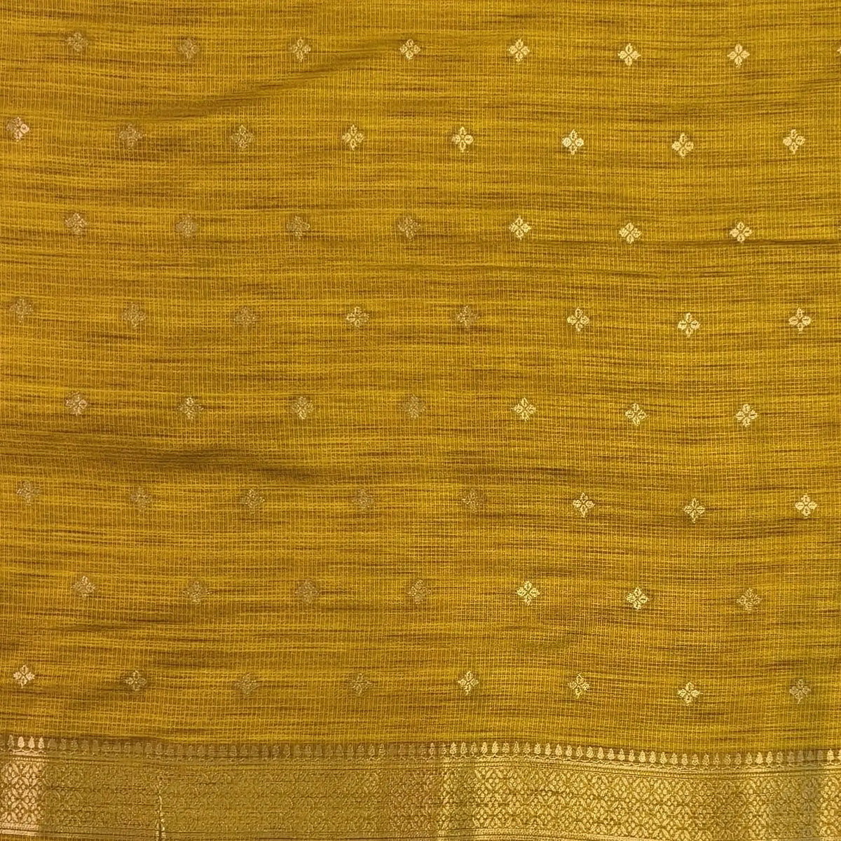 Fenugreek yellow premium ribbed silk saree(textured,thin)with silver and antique gold zari,weaving all over,antique gold zari woven pallu,running blouse with zari woven buttas and borders. NS253