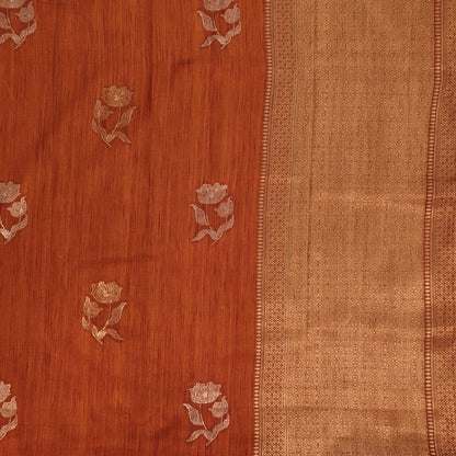 Rust orange premium ribbed silk saree(textured,thin)with silver and antique gold zari,weaving all over,antique gold zari woven pallu,running blouse with zari woven buttas and borders. NS256