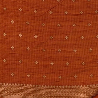 Rust orange premium ribbed silk saree(textured,thin)with silver and antique gold zari,weaving all over,antique gold zari woven pallu,running blouse with zari woven buttas and borders. NS256