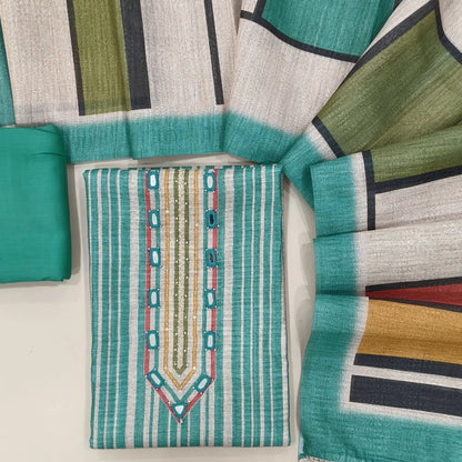 Turquoise blue jute silk unstitched salwar material, embroidery & real mirror on yoke,vertical printed all over,(textured, lining needed) spun cototn bottom, abstract printed jute silk dupatta. OC261311
