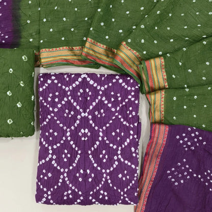 Purple bandhini tie and dye pure cotton unstitched salwar material,(lining needed)leafy green tie and dye cotton bottom,dual shaded tie and dye mul cotton dupatta with resham borders. OC261305