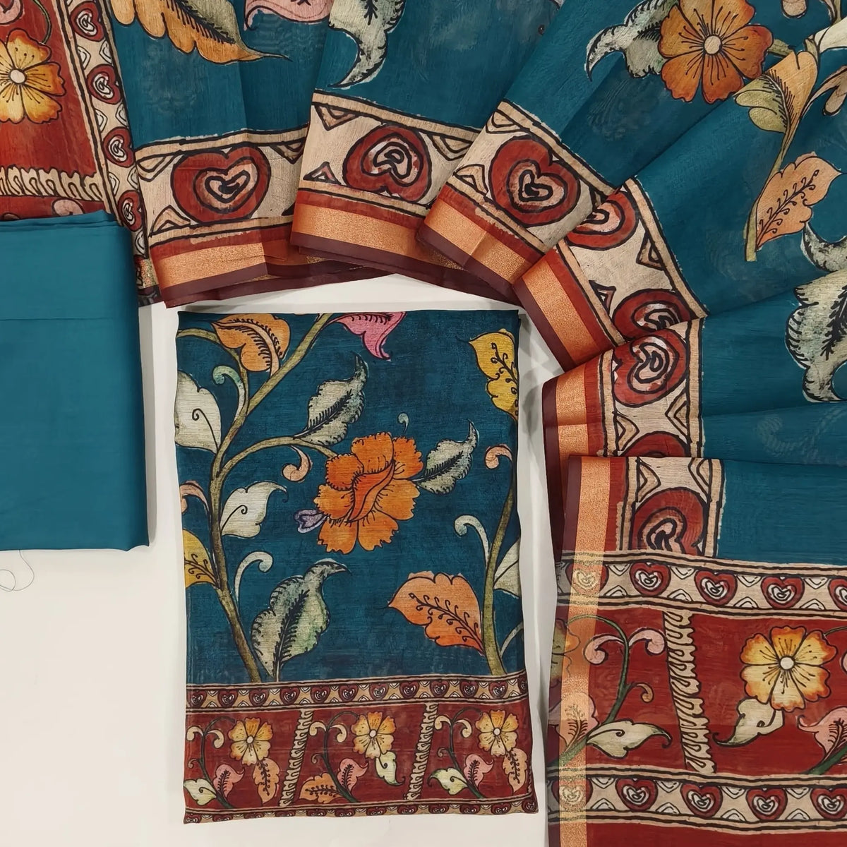 Dark teal green chanderi silk cotton unstitched salwar material, floral printed all over,(lining needed) spun cotton bottom, digital printed full length premium chanderi silk cotton dupatta with  tissue borders. OC261301