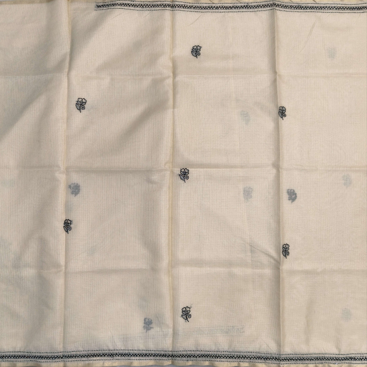 Rich beige premium kota silk saree with rich hand embroidery all over,(soft,thin)rich embroidery on pallu,running kota silk blouse with borders. NS269