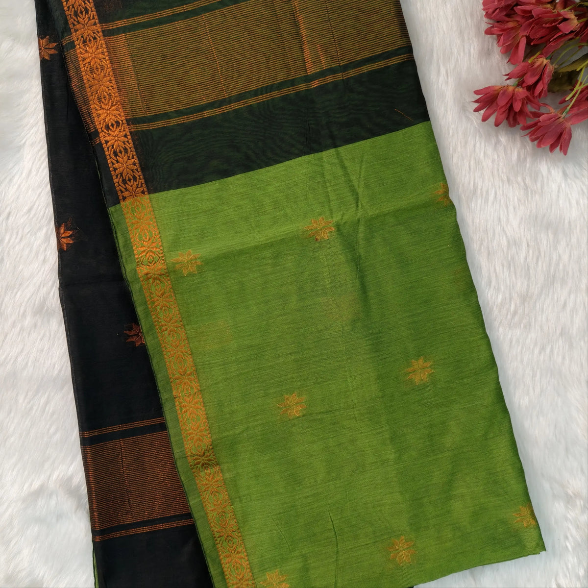 Black and leafy green semi maheshwari silk cotton saree (thin, lightweight) zari woven borders and buttas all over, contrast pallu, plain running blouse with borders. NS357