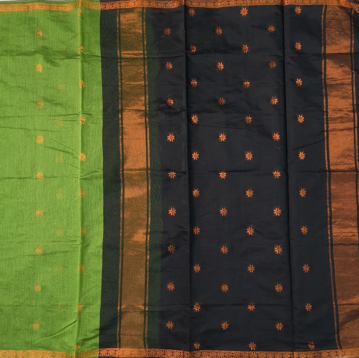Black and leafy green semi maheshwari silk cotton saree (thin, lightweight) zari woven borders and buttas all over, contrast pallu, plain running blouse with borders. NS357