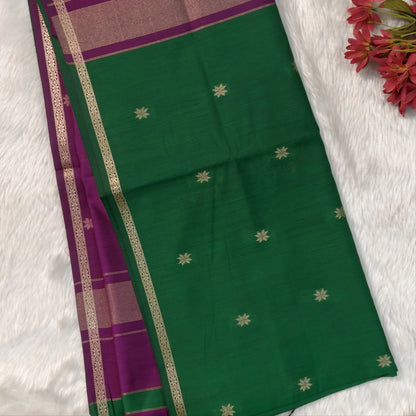 Purple and green semi maheshwari silk cotton saree (thin, lightweight) zari woven borders and buttas all over, contrast pallu, plain running blouse with borders. NS359