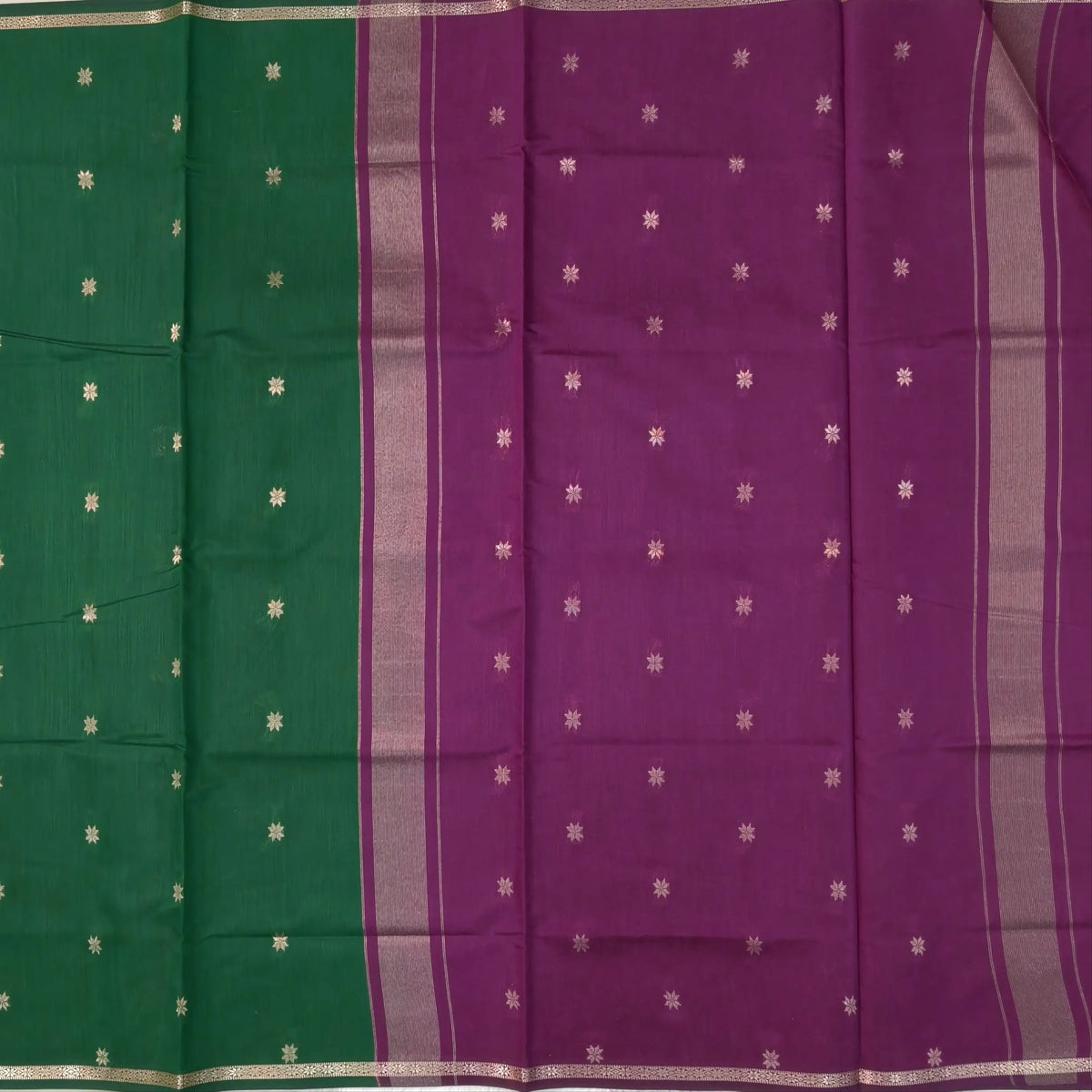 Purple and green semi maheshwari silk cotton saree (thin, lightweight) zari woven borders and buttas all over, contrast pallu, plain running blouse with borders. NS359